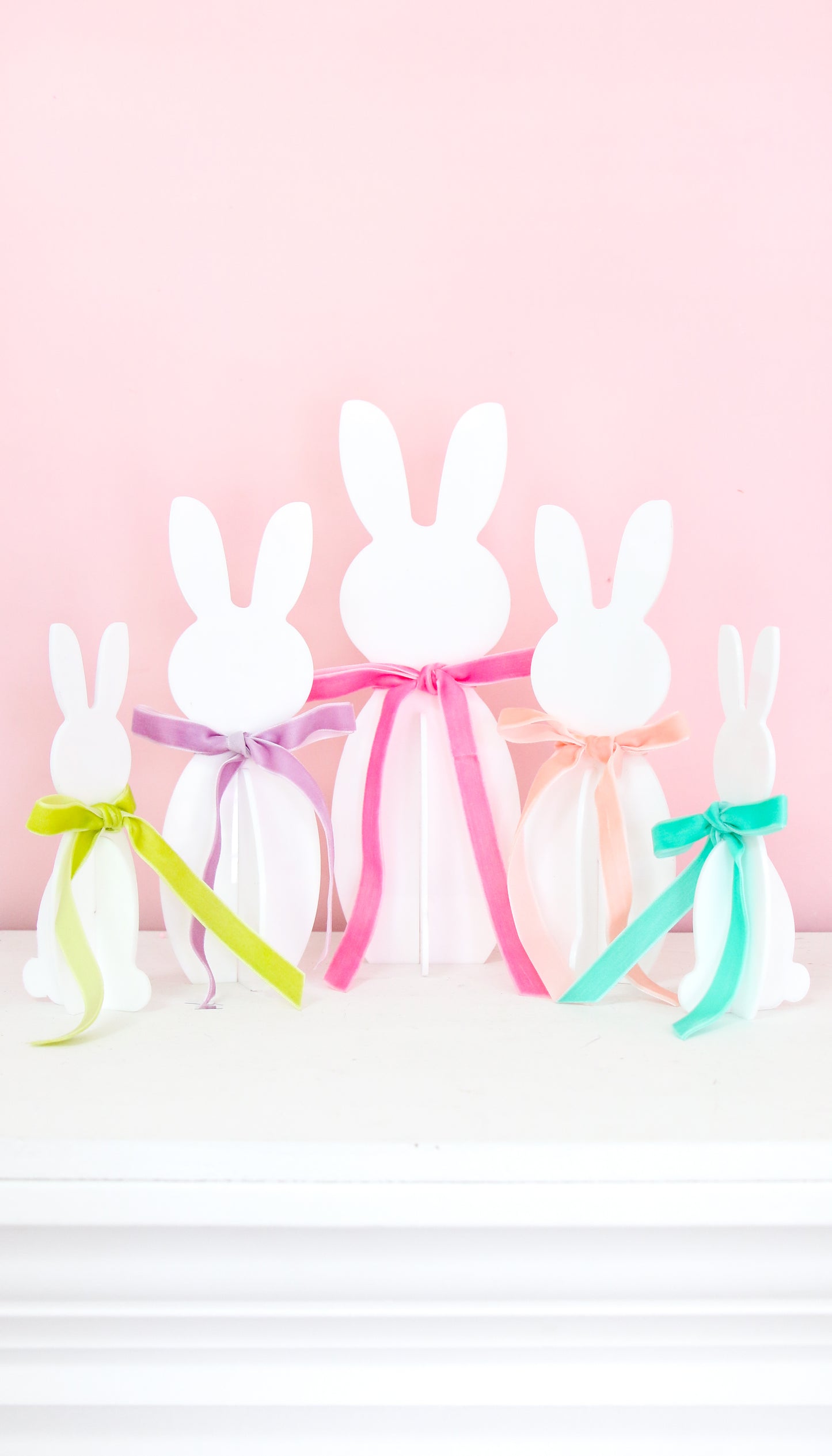 White acrylic Easter bunnies with bows
