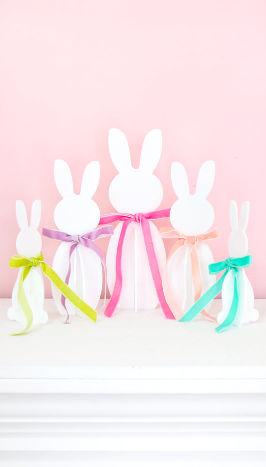White acrylic Easter bunnies with bows