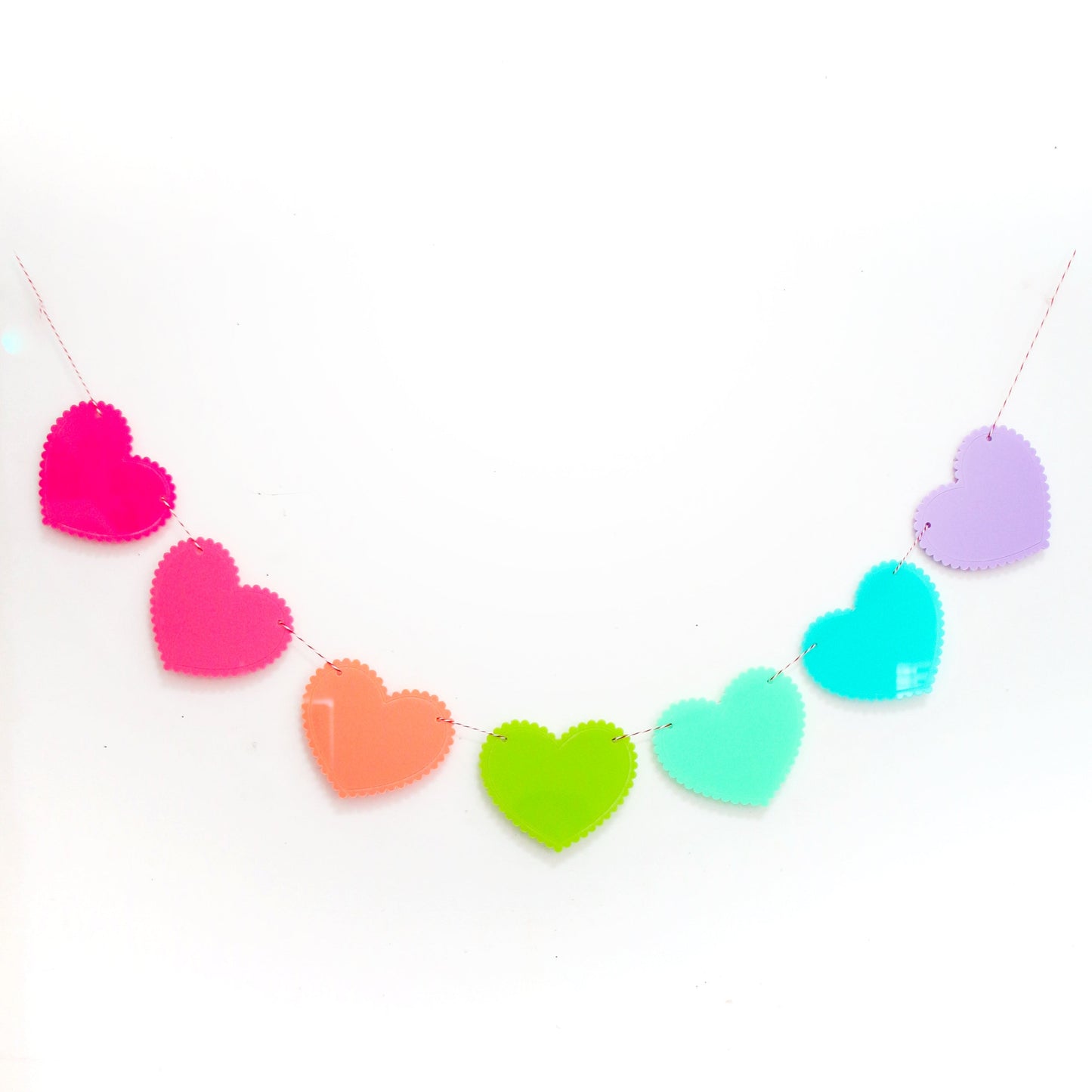 Scalloped edge acrylic heart garland